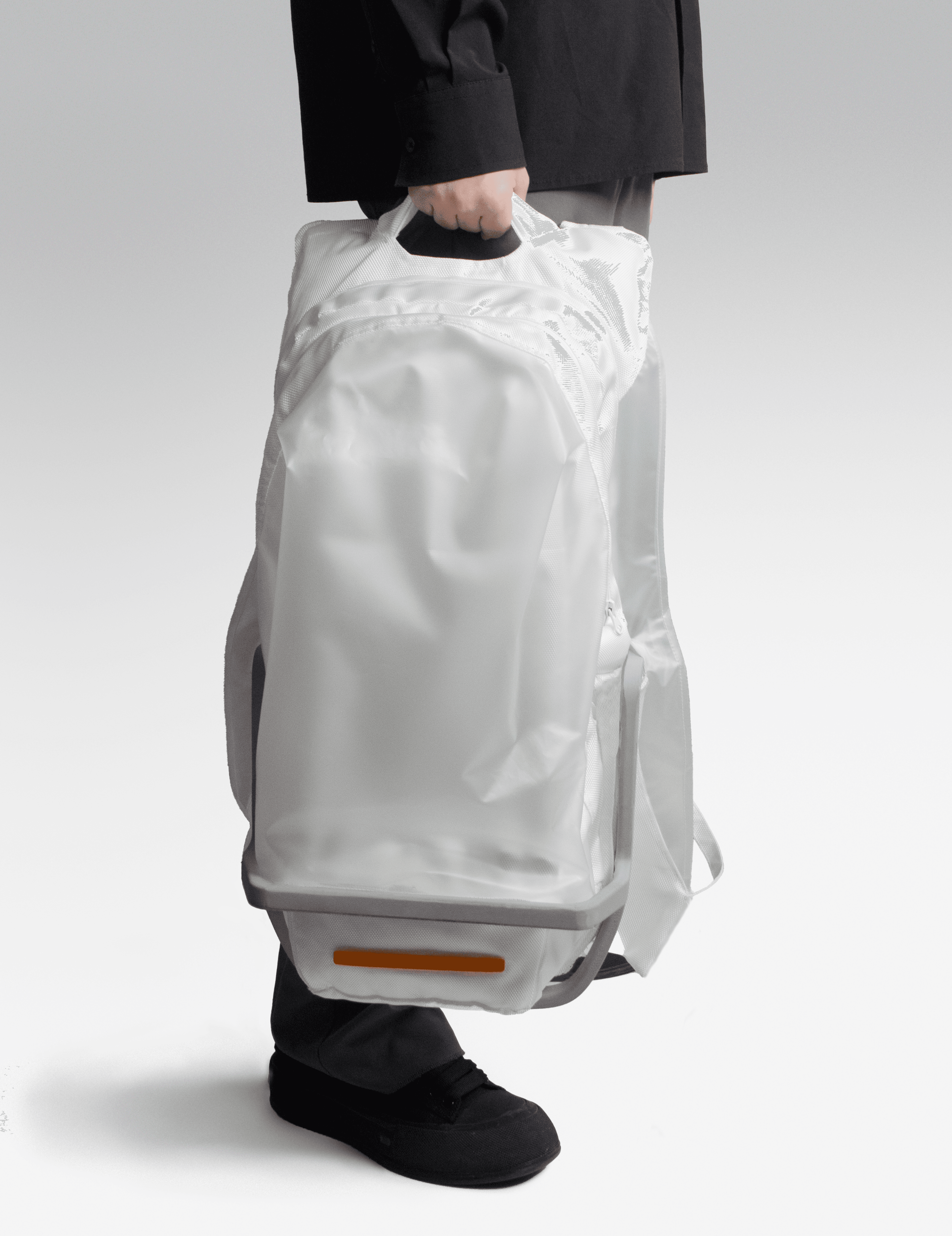 Translucent rain-shell backpack worn — product detail