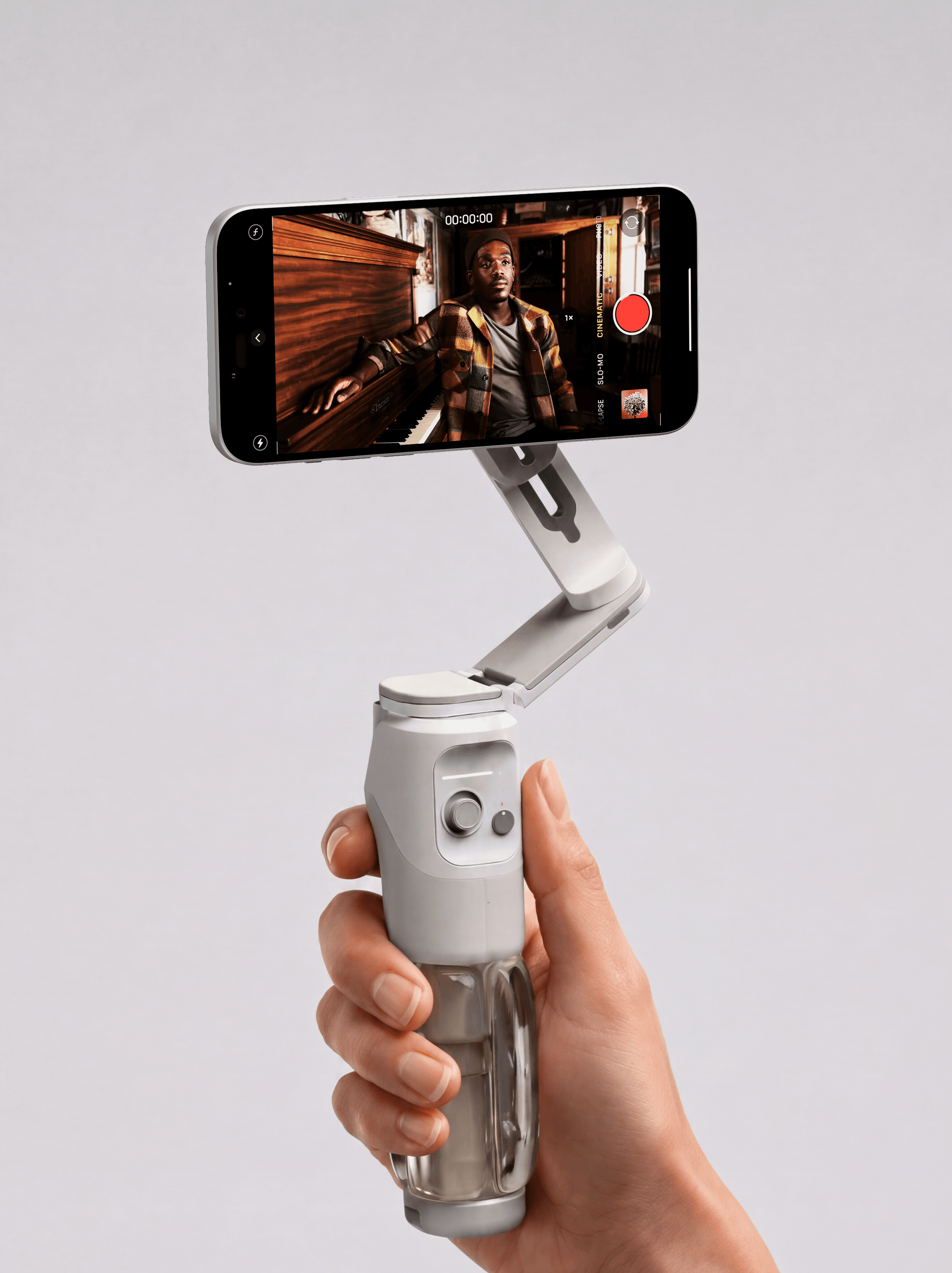 Phone mounted on articulated handheld grip — product detail